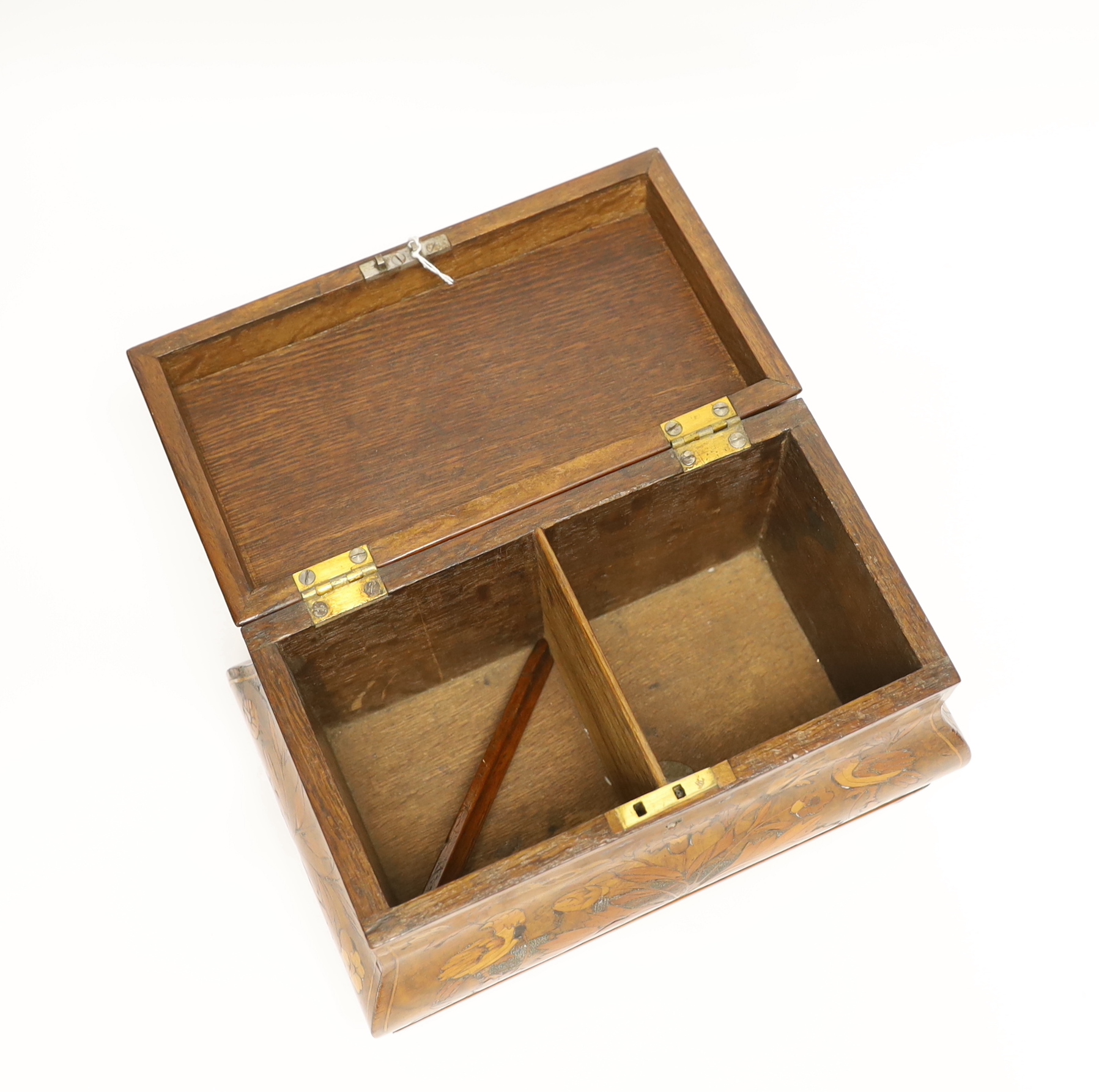 An 18th century Dutch floral marquetry bombé shaped tea caddy, 26cm wide